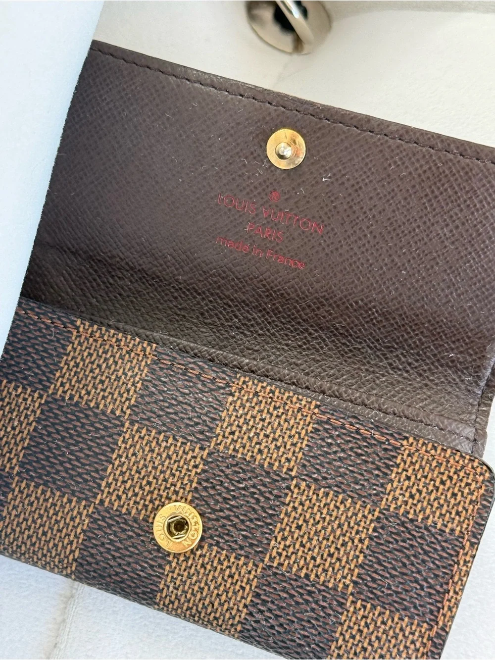 SOLD Louis Vuitton Brown Damier Ebene Canvas Key Pouch with Gold Button